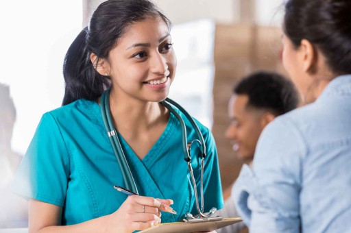 doctor talking to patient